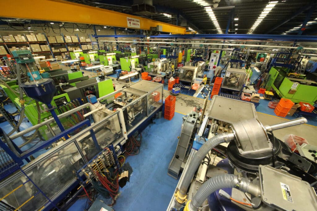 Advanced manufacturing facility with precision machinery and production lines used to engineer high‑quality poly fittings and valves.